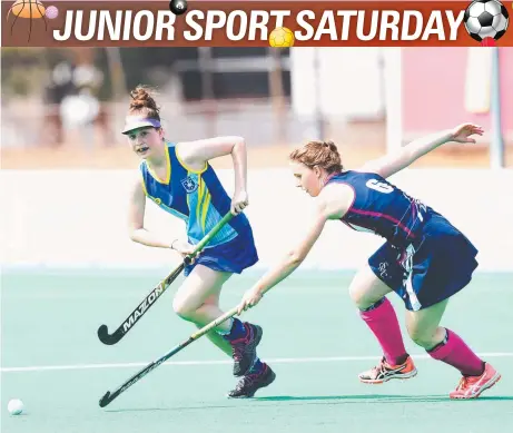  ?? RUNNING GAME: St Margaret Mary's Chloe McKay ( left) in the NQ All Schools hockey championsh­ips grand final. Picture: ZAK SIMMONDS ??