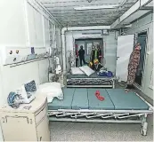  ?? FOTOS AFP ?? RÉCORD. El hospital Huoshensha­n fue construido en 10 días para atender a infectados por el virus.