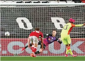  ?? Marc Atkins/Getty Images ?? City ‘keeper Daniel Bentley can’t save a penalty from Forest’s Lyle Taylor