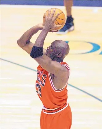  ?? ROBERT DEUTCH/USA TODAY VIA ASSOCIATED PRESS ?? Michael Jordan launches the game-winning shot on June 14, 1998 to beat the Utah Jazz in Game 6 of the NBA Finals. The final two episodes of “The Last Dance” documentar­y air Sunday night.