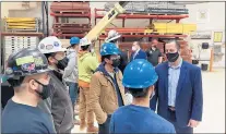  ?? TED SLOWIK/DAILY SOUTHTOWN ?? State Sen. Michael Hastings, D-Frankfort, talks with workers Wednesday at the Chicago Regional Council of Carpenters Apprentice­s and Training Program facility in Elk Grove Village.