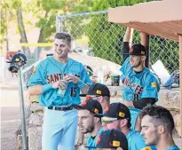  ?? COURTESY OF SANTA FE FUEGO ?? Rookie third baseman Chris Kwitzer (No. 15) is one of five players, along with manager T.J. Zarewicz, from the Fuego who been promoted for a trial run in the Can-Am League. Most of their games will be played in Canada.