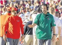  ?? MARKWALLHE­ISER/AP ?? Hurricanes coach Manny Diaz takes his football team on the road for the first time as Miami plays at Louisville on Saturday.