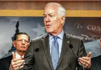  ?? Samuel Corum / Getty Images ?? U.S. Sen. John Cornyn says he expects the coastal barrier project’s approval, but obtaining funds could take years.