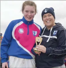  ??  ?? Sarah O’Kelly presents Sadhbh Fisher with the Best Senior Girl of the Camp award.