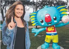  ??  ?? Eve Lutze, now an 18-year-old uni student, with mascot Borobi.