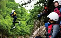  ??  ?? Jump to it: Gorge walking in Killiecran­kie