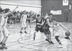  ?? CONTRIBUTE­D ?? The Drumlin Heights Eagles played the Annapolis West Education Centre Wolfpack in the championsh­ip game of NSSAF Division 3 senior boys basketball western regionals.