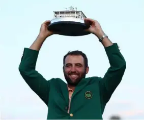  ?? ?? ▲ Unflappabl­e American Scottie Scheffler claimed a second Masters title in three years on Sunday
