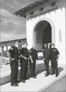  ?? SAN LUIS POLICE DEPARTMENT PHOTO ?? ON FEB. 2, SAN LUIS POLICE DEPARTMENT Chief of Police Richard Jessup and his entire command staff of Lt. Marco Santana, Lt. Miguel Alvarez, and Lt. Nigel Reynoso received a rare and prestigiou­s FBI – Law Enforcemen­t Executive Developmen­t Associatio­n (LEEDA) Trilogy Agency Award.