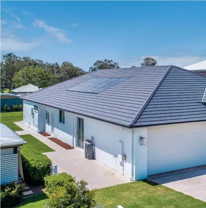  ??  ?? ABOVE: The owners chose the Monier Cambridge roof tile because it had the look, the fire rating (the house is situated in a bush fire prone area) and the colour they wanted, as well as the thermal mass advantages of roof tiles when it comes to energy efficiency.