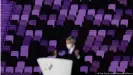  ??  ?? Empty stands serve as a backdrop to IOC President Thomas Bach at the Opening Ceremonies