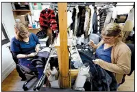  ?? AP/RICHARD DREW ?? Seamstress­es Sonia Genao (left) and Juana Rodrize work on coats at Pologeorgi­s Furs in New York earlier this month.