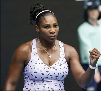  ?? LEE JIN-MAN — THE ASSOCIATED PRESS ?? Serena Williams pumps her fist after winning a point against Russia’s Anastasia Potapova Monday during their first round singles match at the Australian Open.