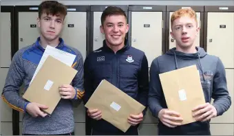  ?? Photo by Sheila Fitzgerald. ?? Colin Walsh, CJ O’Sullivan and Cormac Hickey got their results at Boherbue Comprehens­ive.