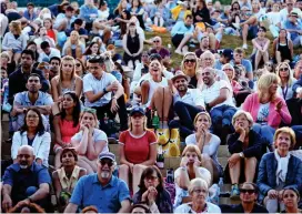  ??  ?? Switch: Fans on Henman Hill missed the end of Konta’s match