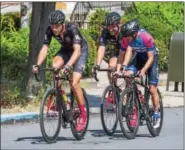  ?? SUBMITTED PHOTO - DENNIS KRUMANOCKE­R ?? Reading 120 bike race rides through Kutztown on Sept. 10.