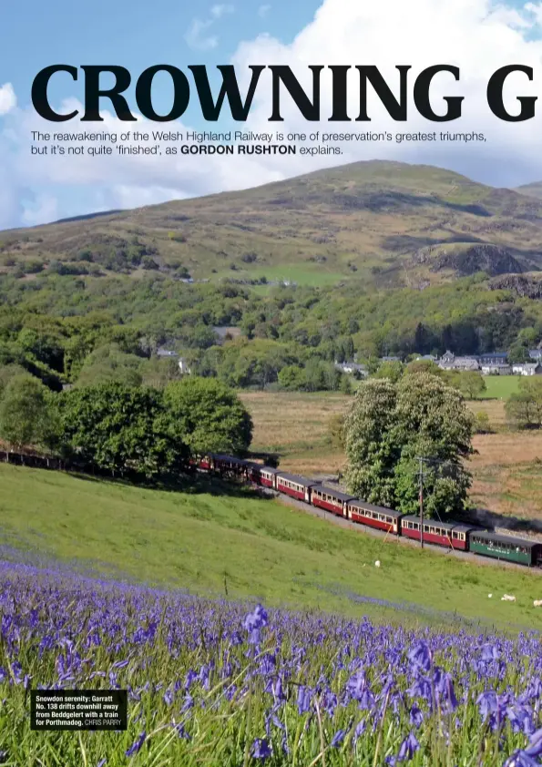  ?? CHRIS PARRY ?? Snowdon serenity: Garratt No. 138 drifts downhill away from Beddgelert with a train for Porthmadog.