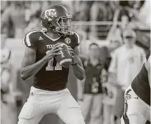  ?? Bob Levey / Getty Images ?? Kellen Mond completed 12 of 21 passes for 105 yards while playing into the third quarter of Texas A&M’s victory.