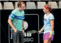  ?? JASON DORDAY/FAIRFAX NZ ?? Simon Rea had plenty of good advice for Marina Erakovic at the ASB Classic.