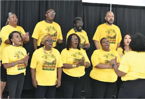  ?? (Pine Bluff Commercial/I.C. Murrell) ?? The Pine Bluff Juneteenth Community Choir performs a song during the city’s Juneteenth Celebratio­n on Saturday.