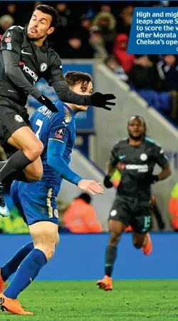  ?? GETTY IMAGES ?? High and mighty: Pedro leaps above Schmeichel to score the winner after Morata curls in Chelsea’s opener (right)