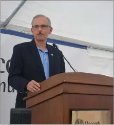  ??  ?? Dr. Christophe­r Gorecki, executive director of the Macomb Dental Society, speaks at the opening of the new Dental Science program building on the Macomb Community College South Campus in Warren.
