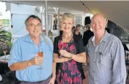  ?? Picture: SALVELIO MEYER ?? FINE DINING: Guests Peter Raymer, left, Sue Wardrop and Andre Calitz were at last Tuesday’s launch of Meridian Wine Merchants’ new wine and culinary centre in Main Road, Walmer