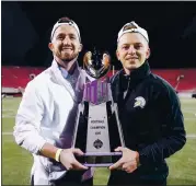  ?? PHOTO COURTESY OF CAM RADFORD ?? San Jose State’s Cam Radford, right, and Ryan O’Rorke pose with the Mountain West championsh­ip trophy.