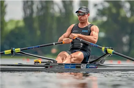  ?? PHOTOSPORT ?? Robbie Manson headed home two young Germans in the men’s single scull final at the World Cup regatta in Austria.