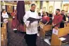  ?? New Mexican file photo ?? The Rev. Adam Lee Ortega y Ortiz celebrates Good Friday Mass in 2017 at the Cathedral Basilica of St. Francis of Assisi. The cathedral rector spoke after Mass recently and said he’d be leaving his position.