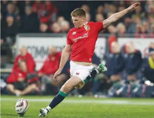  ??  ?? In front: Owen Farrell kicks his first penalty