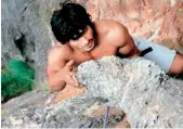  ?? ?? Vidyut Jamwal while rock climbing outdoors