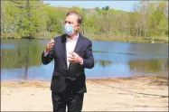  ?? Pat Eaton-Robb / Associated Press ?? Gov. Ned Lamont speaks to reporters at Gay City State Park in Hebron last week.