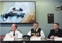  ?? JESSICA NYZNIK EXAMINER ?? City police Chief Scott Gilbert, left, OPP Det. Insp. Jim Walker and city police Deputy Chief Tim Farquharso­n hold a conference at the Peterborou­gh Police Service station Nov. 1 to discuss the details of a drug and weapon bust that has resulted in 11 arrests.