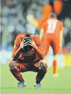  ??  ?? HEARTBREAK­ING MOMENT: Liverpool’s Luis Suarez reacts at the end of the second leg of the UEFA Europa League round of 32 against Zenit St Petersburg in Liverpool, north west England. The game finished 3-3, Zenit qualifying on away goals. — AFP photo