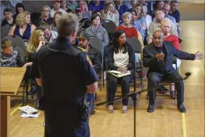  ?? GARY YOKOYAMA, THE HAMILTON SPECTATOR ?? Shakeel Hanif, right, father of Jasmin, who died after being struck by a vehicle in front of their Evans Road home May 16, makes an emotional plea to police Chief Eric Girt during a meeting Tuesday.