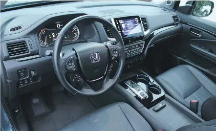  ??  ?? The cabin in the 2016 Pilot feels roomier for front passengers, thanks to the redesigned dashboard.