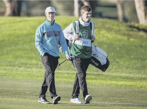  ?? ?? Craig Howie walks with brother Darren during the second round of the Rolex Challenge Tour Grand Final in Mallorca.