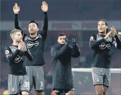  ?? PICTURE: PA ?? EXALTED COMPANY: Josh Sims, left, with Southampto­n team- mates including Virgil van Dĳk after the 2016 League Cup quarter- final.