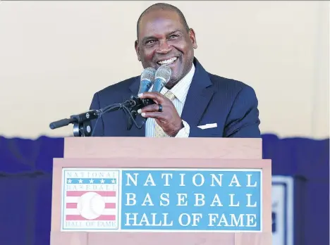  ?? MIKE STOBE/GETTY IMAGES ?? Tim Raines gives his speech at the National Baseball Hall of Fame induction ceremony on Sunday in Cooperstow­n, N.Y.