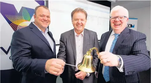  ?? Picture / Jason Oxenham ?? Chief executive Murray Holdaway (centre) with chairman Kirk Senior (left) and NZX chief Tim Bennett at Vista Group’s debut.