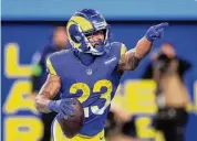  ?? Sean M. Haffey/Getty Images ?? Kyren Williams ran for 104 yards and a touchdown to help the Rams earn their fifth win in six games.