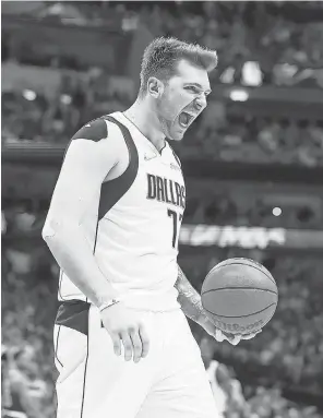  ?? KEVIN JAIRAJ/ USA TODAY SPORTS ?? Mavericks guard Luka Doncic reacts during the fourth quarter against the Suns in Game 3 of the Western Conference semifinal series.