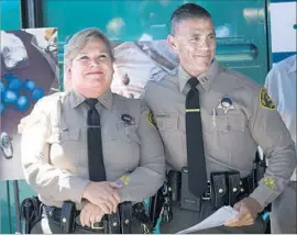  ??  ?? SHERIFF’S Cmdr. Judy Gerhardt and Capt. Robert Lewis are working to equip all deputies at the Santa Clarita Valley station with an anti-opioid nasal spray.