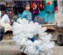  ?? — AFP ?? Cairo’s recyclable garbage drive has been enthusiast­ic, with local children volunteeri­ng to dispose household waste and earn extra pocket money.