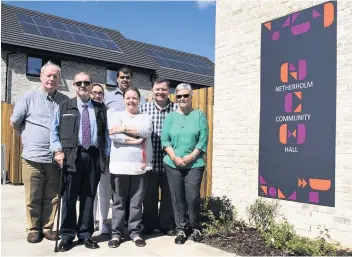  ??  ?? Delight Residents in Castlemilk celebrate the opening of the new hall recently