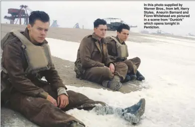  ??  ?? In this photo supplied by Warner Bros., from left, Harry Styles, Aneurin Barnard and Fionn Whitehead are pictured in a scene from “Dunkirk” which opens tonight in Penticton.