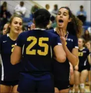  ?? BARRY TAGLIEBER — FOR DIGITAL FIRST MEDIA ?? Pope John Paul II’s Hanna Tulli and Chelsea Harvey celebrate with teammates after Tuesday’s PAC semifinal win against Boyertown.