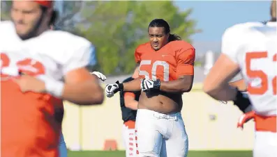  ?? JOURNAL FILE ?? UNM offensive lineman Teton Saltes, a Valley High alumnus shown during practice last year, believes the team has bonded through extra workout sessions and exercises in self-revelation during the past offseason.